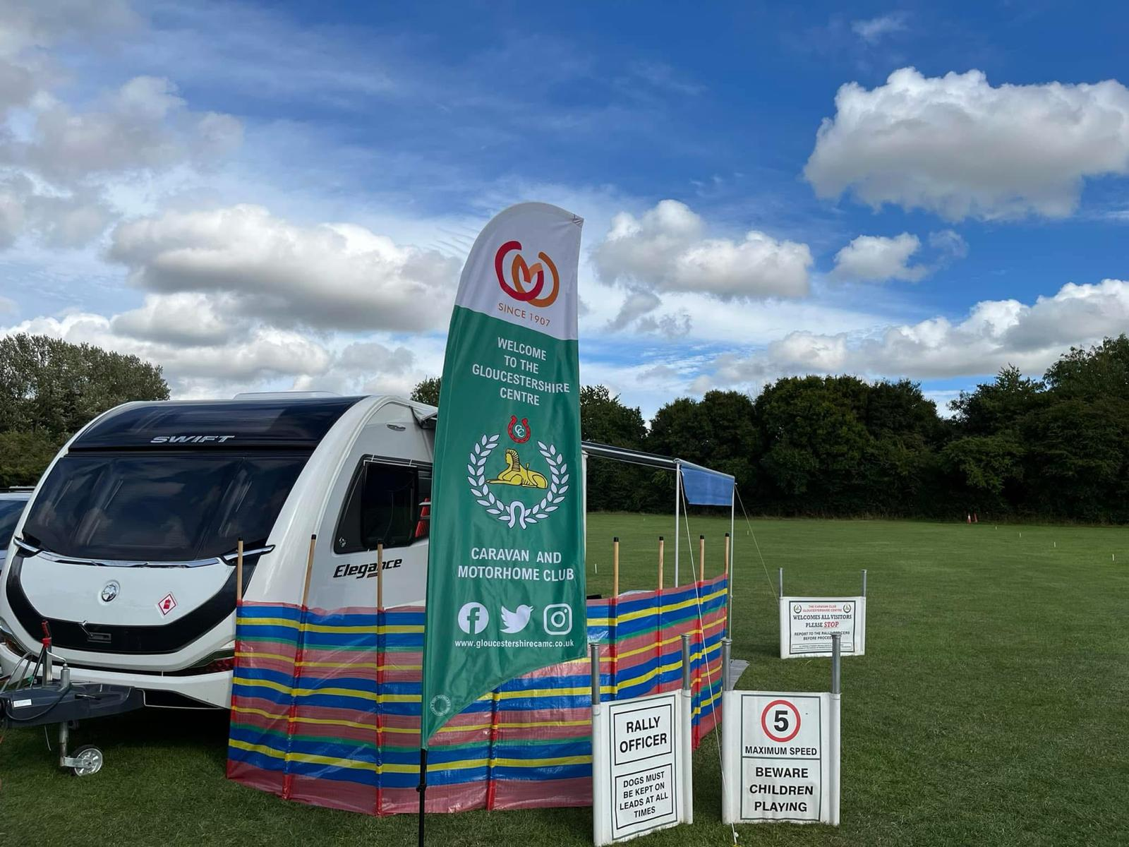 Caravan with Gloucestershire Centre Flag